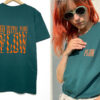 Unisex T-Shirt Flow, Farbe Flaschengrün, Druck Orange
